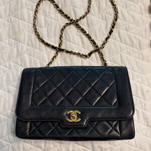 CHANEL Black Quilted Shoulder Bag with Gold Accents
